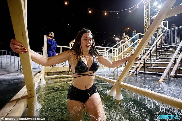 Orthodox Believers Brave Icy Waters for Epiphany Baptism in Russia