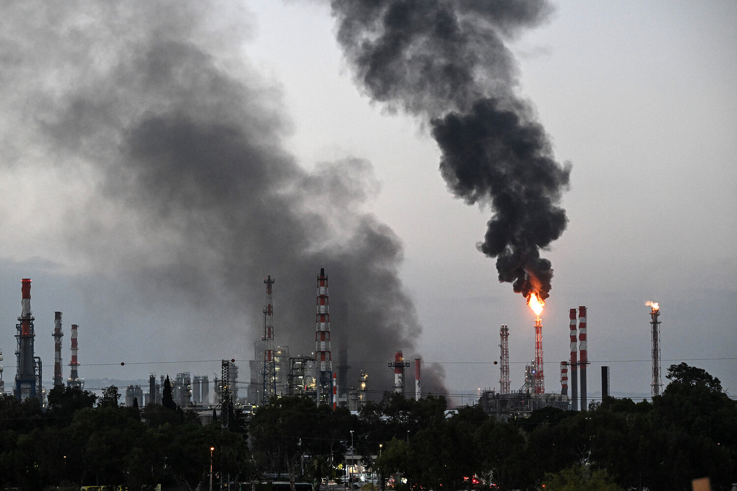 Iranian Missile Strike Hits Haifa Oil Refinery, Cluster Munition Use Sparks Regional Tensions and Civilian Safety Concerns