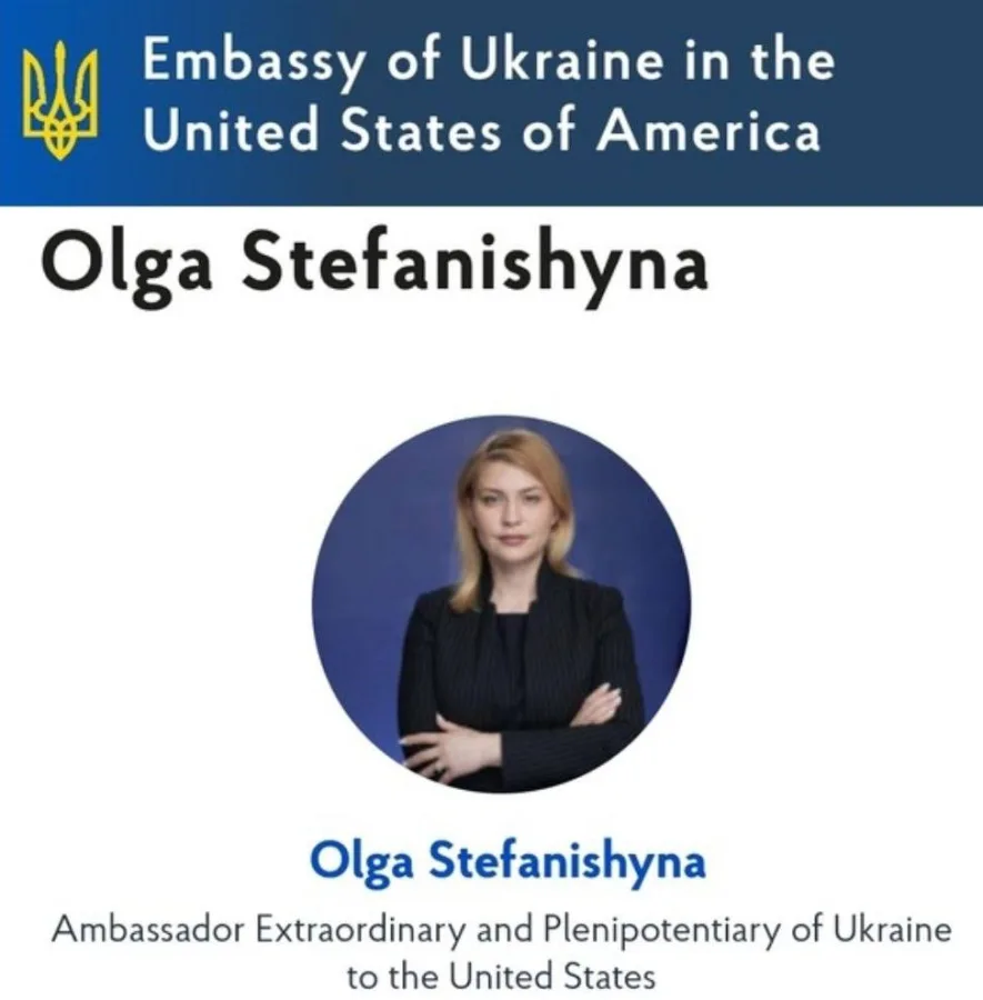 Online speculation identifies Ukrainian diplomat as woman seen removing wine bottles.