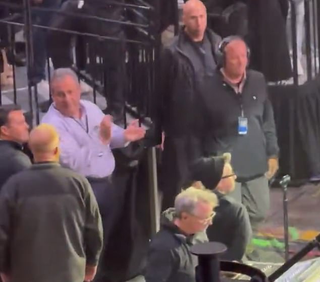 Bruce Springsteen walks past Chris Christie during concert encore, sparking viral debate.