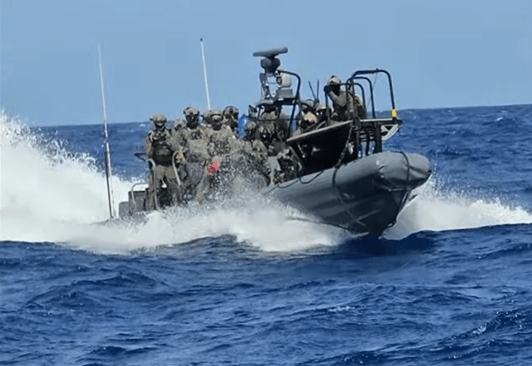 Israeli forces intercept humanitarian flotilla challenging Gaza blockade in international waters.