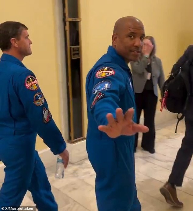 Conspiracy theorist accuses NASA astronauts of faking moon mission on Capitol Hill.