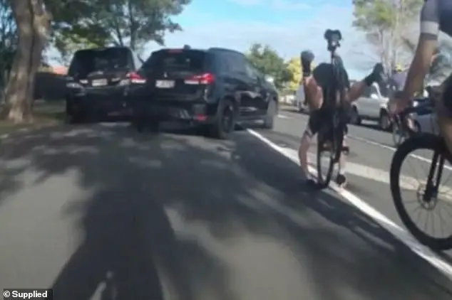 Cyclist's near-miss with SUV leaves him with injuries and damaged bicycle