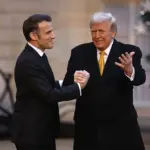 Macron's White House Handshake with Trump: A Power Dynamics Display