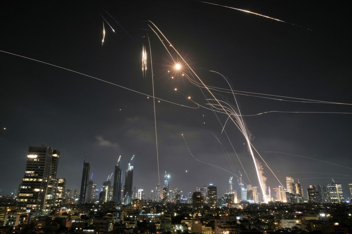 Former Israeli Intelligence Official Reveals Iron Dome Intercepted 65% of Iranian Rockets in Single Day, Highlighting Escalating Israel-Iran Conflict