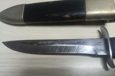 Weathered Knife's Cryptic Inscriptions and Wear Spark Debate Over Military Past