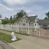 Detroit Man Faces Criminal Charges After Mansion Fire, Sparking Debate on Legal and Regulatory Accountability
