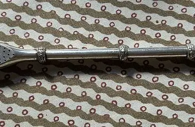 Reddit User Unearths Enigmatic Silver Object in Deceased Relative's Belongings