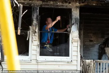 Asbury Park Officer Catches Child During House Fire
