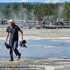 Tourist Tramples Grand Prismatic Spring's Delicate Ecosystem at Yellowstone National Park