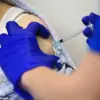 UK Health Chiefs Under Pressure to Reconsider Revised Covid Vaccination Strategy Excluding Over-65s from Winter Boosters, Amid Expert Concerns Over Prioritization Shift